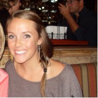 Giraffe licks and kicks SLO woman