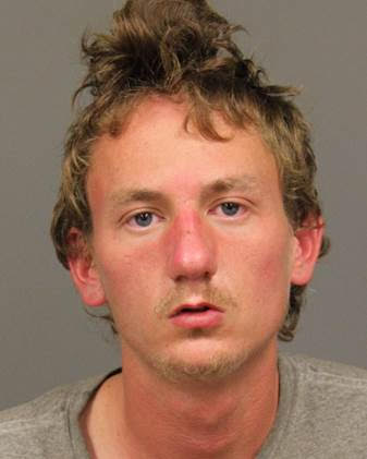 Man punches woman in face in SLO store