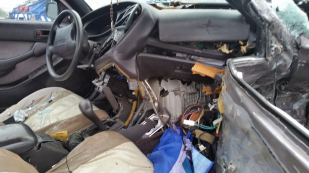 SLO crash traps injured woman in car