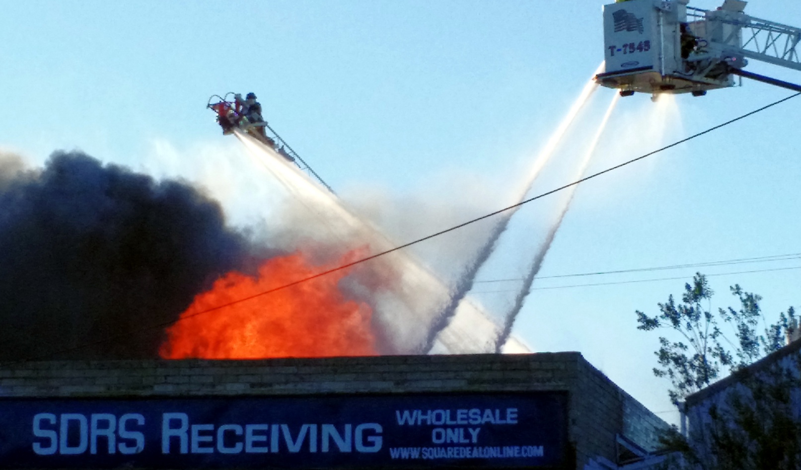 SLO fire burns three businesses, photos