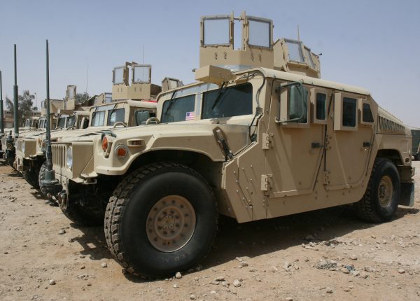One person killed after Humvee crashed into a sedan