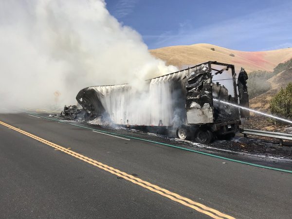 Burning truck ignites fire on Highway 41