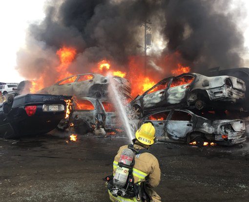 Dozens of vehicles burn in fire at Santa Maria recycling facility