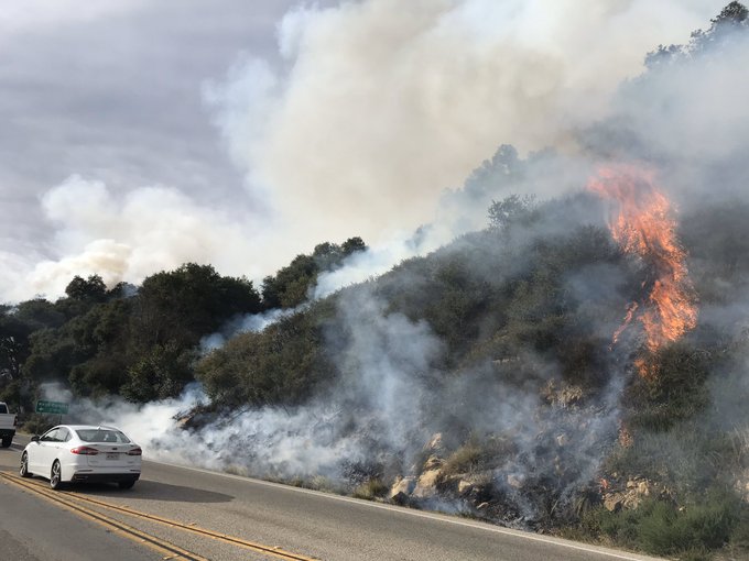 Brush fire temporarily closed Highway 154