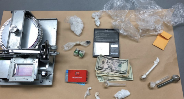 SLO police arrest two people for drugs and credit card fraud