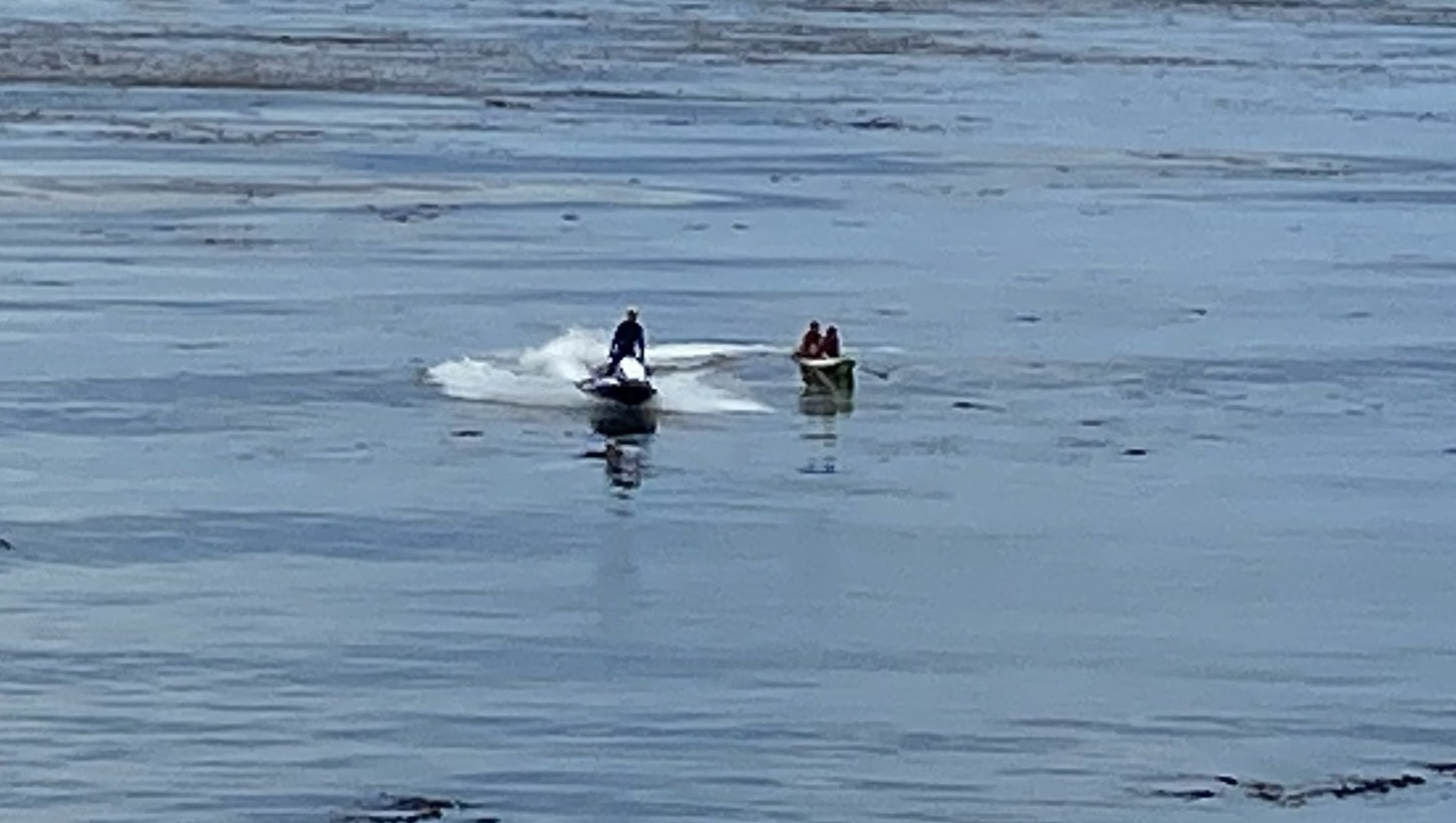 Emergency personnel rescue kayakers off Central Coast beach