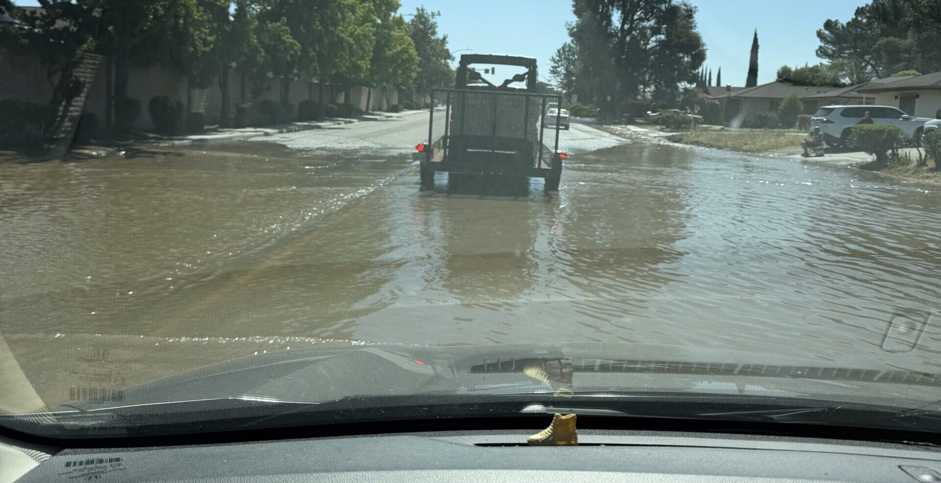 Water main break temporary turns Paso Robles road into a river