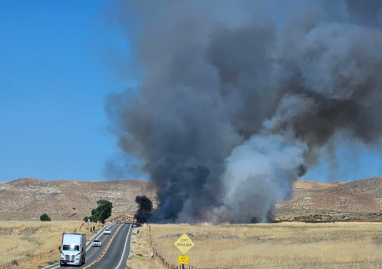 Fire burns hundreds of acres along Highway 166
